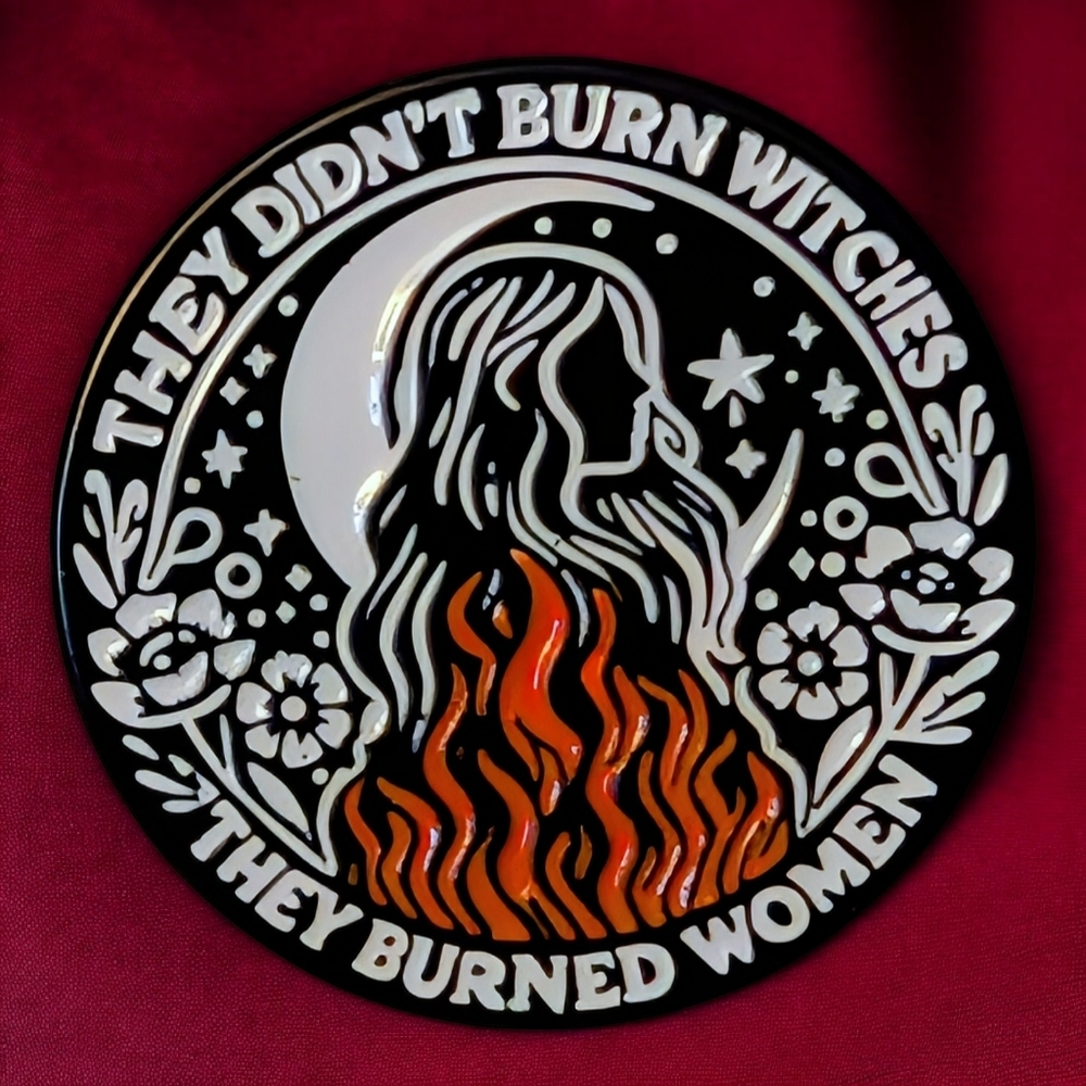 "They Didn't Burn Witches" Enamel Pin In Blac, White & Red